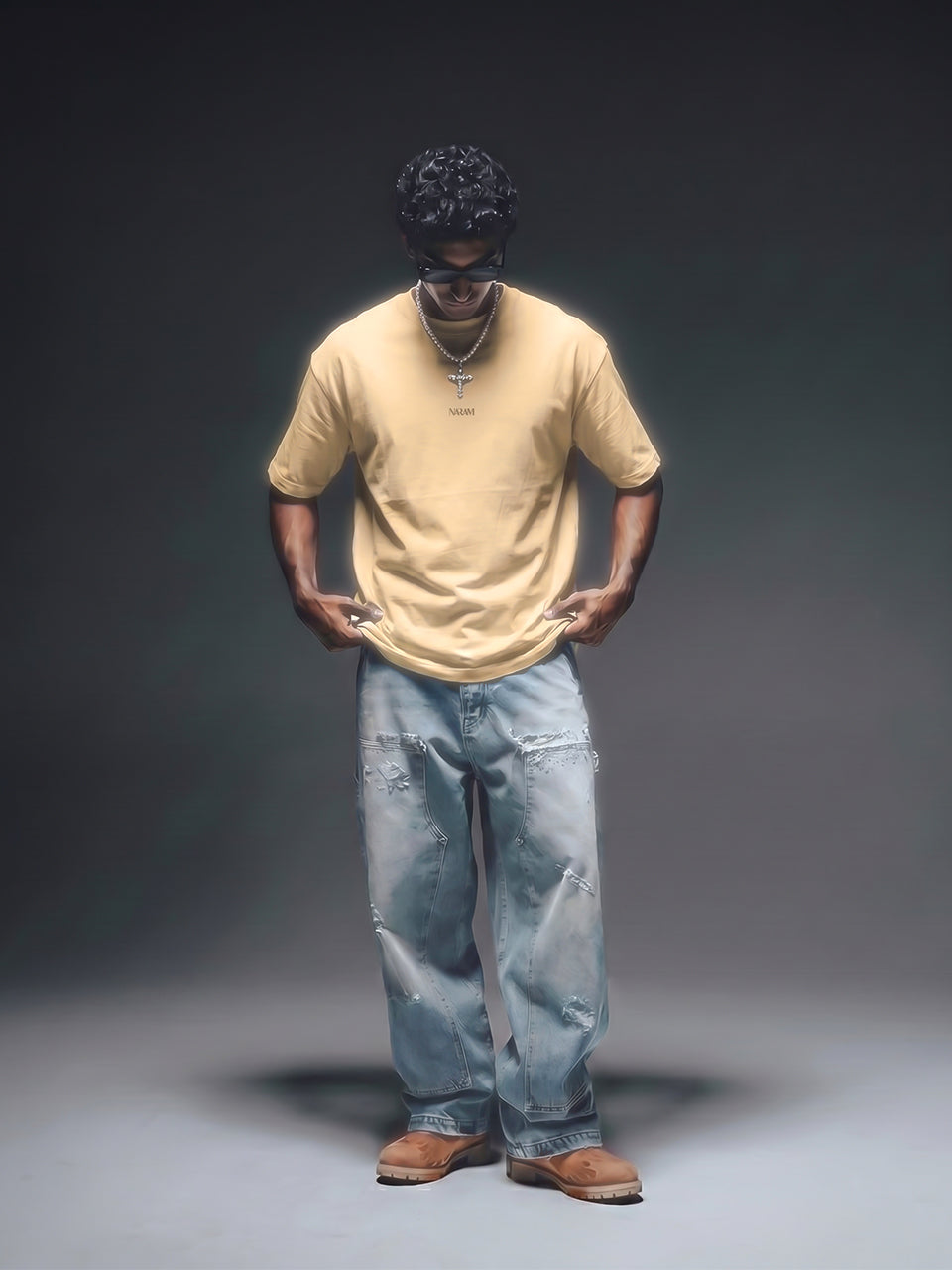 Full body shot of Naram beige oversized t-shirt with wide-leg jeans desi streetwear India