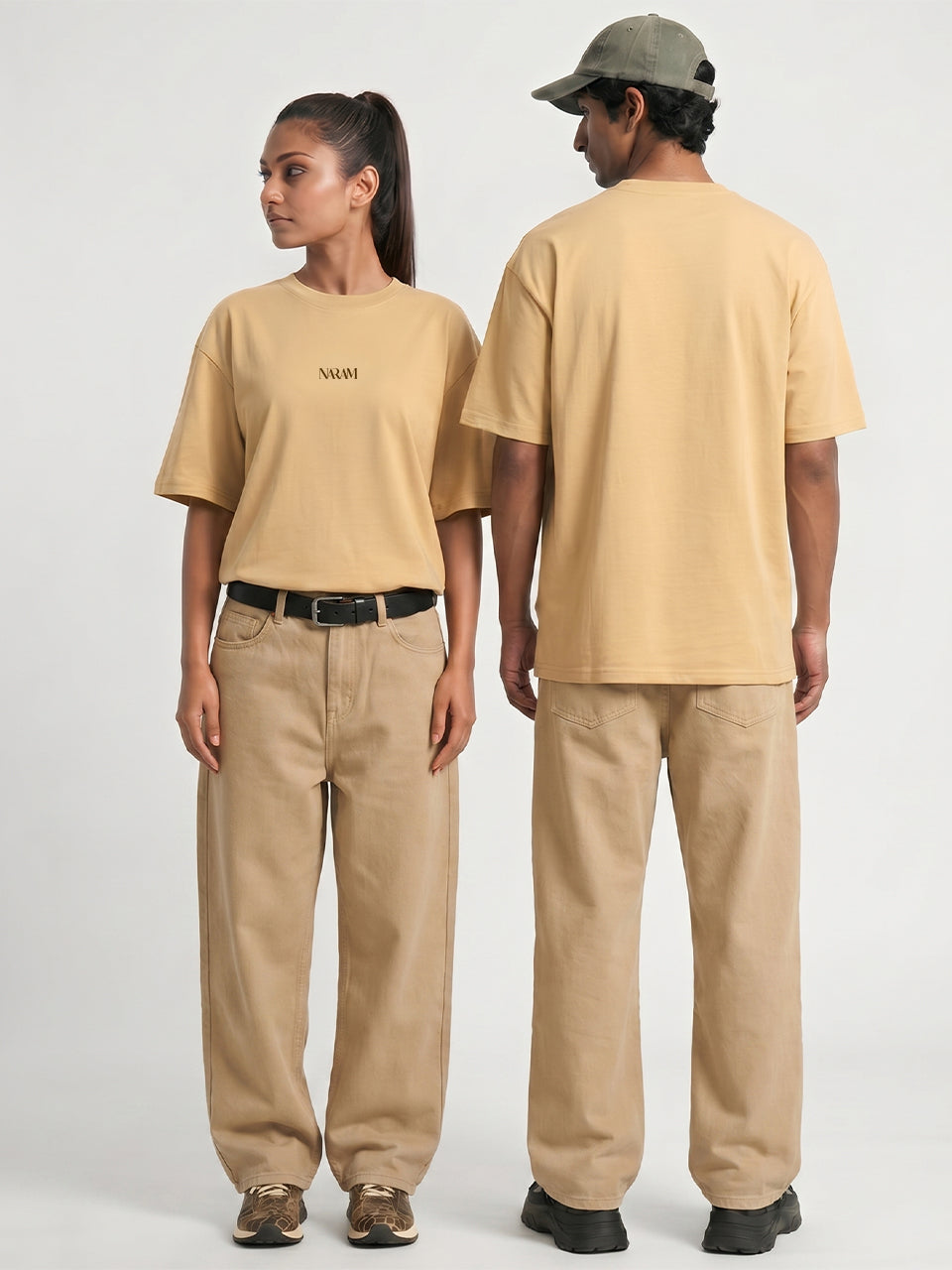 Naram oversized beige t-shirt shown on two models front and back fit streetwear