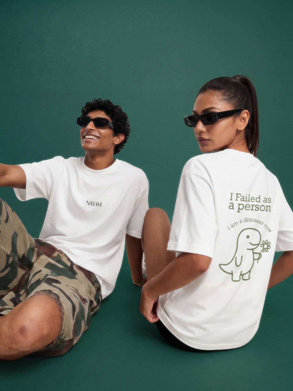 Naram I Failed as a person dinosaur tee two models sitting relaxed desi streetwear India